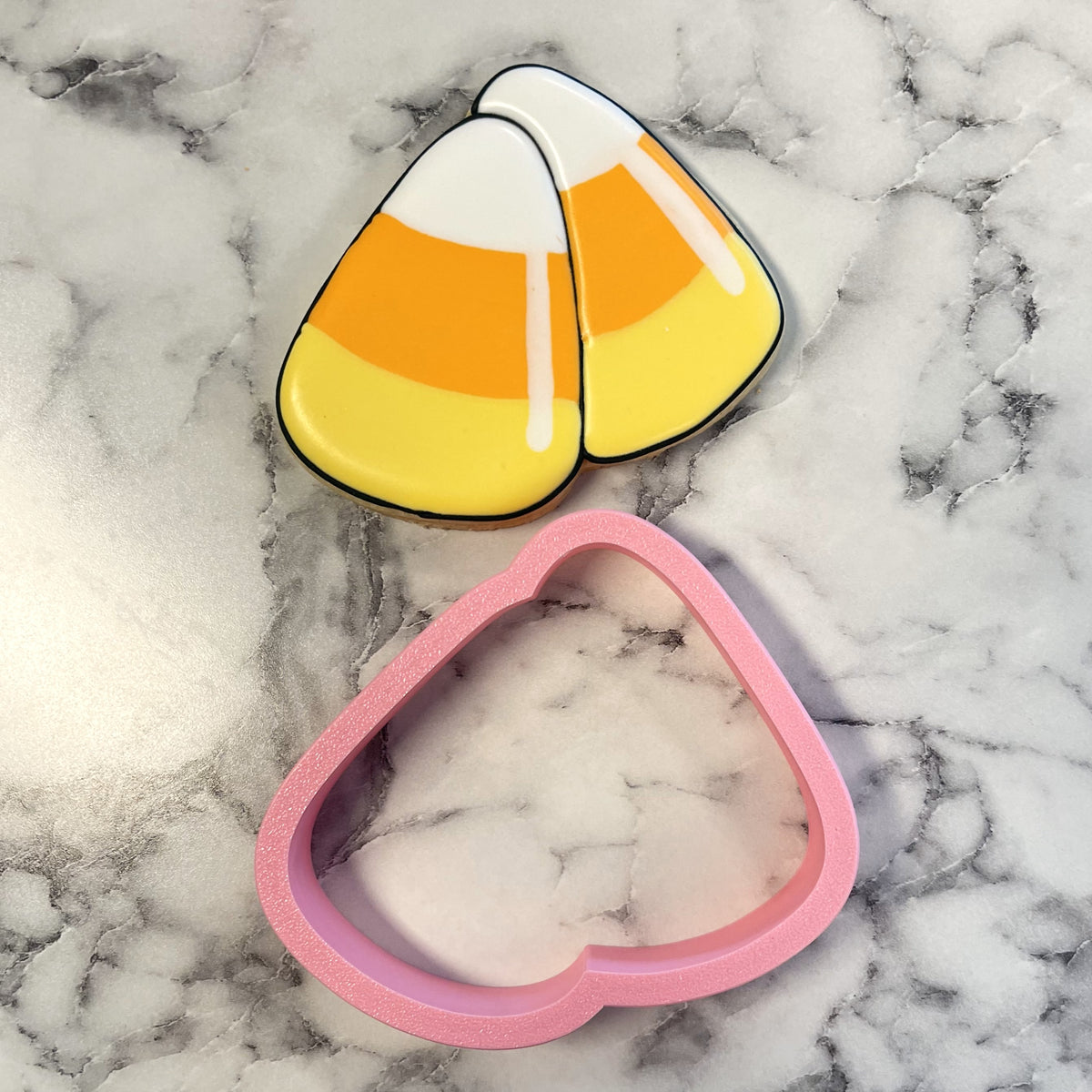 Candy corn cluster flour box club cookie cutter set with glossy candy corn shapes black outlines and pink glitter material
