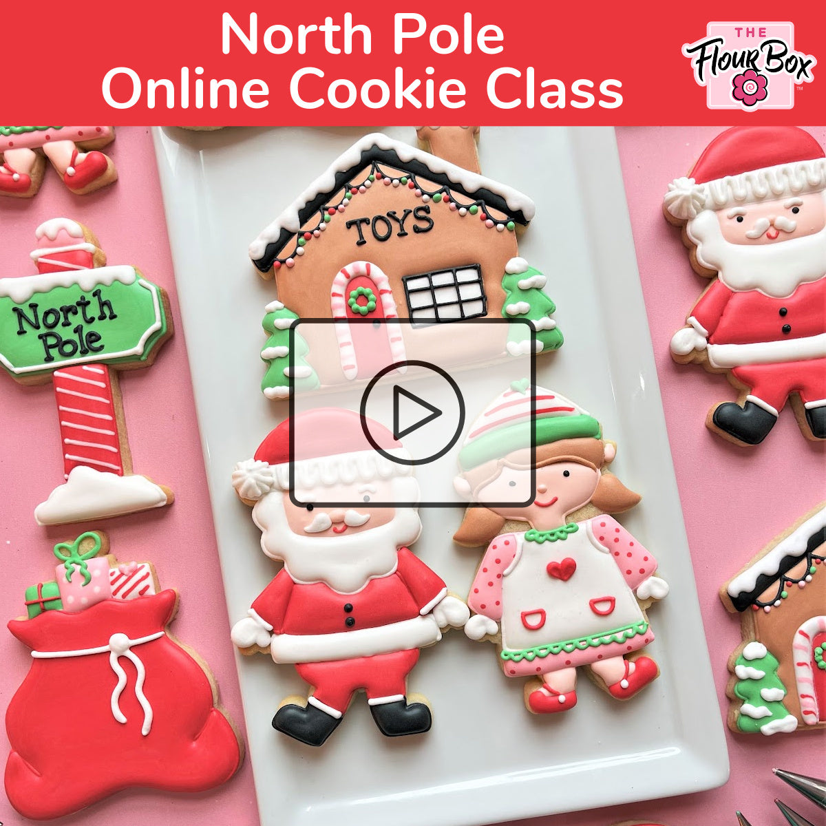 A festive gingerbread house cookie decorated with white icing snow red and green candy canes and toys lettering for north pole cookie decorating class recording
